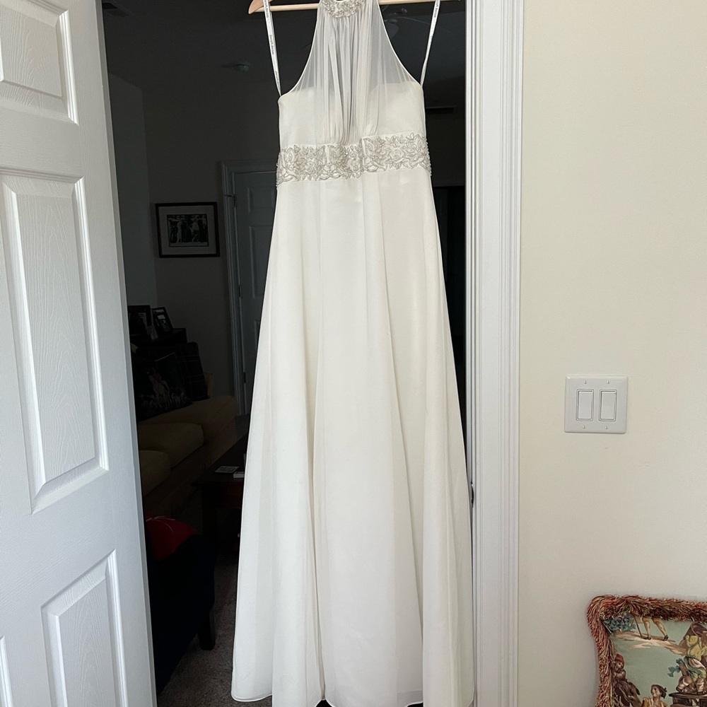 Beaded halter chiffon lined ivory wedding dress.